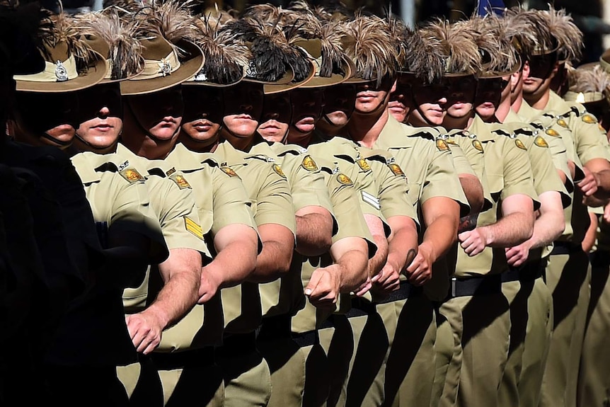 Australian Army soldiers march in an Anzac Day parade