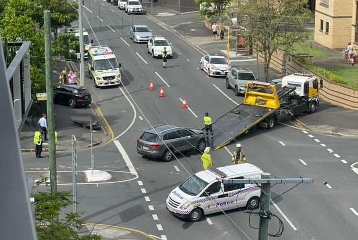 Police car, and two smashed cars at the intersection following the accident on November 8. 