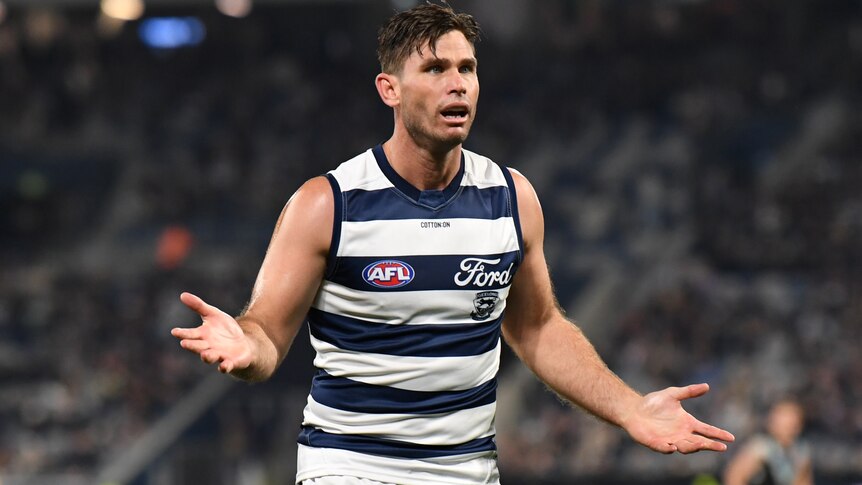Tom Hawkins makes a gesture with his hands during Geelong's AFL loss to Port Adelaide.