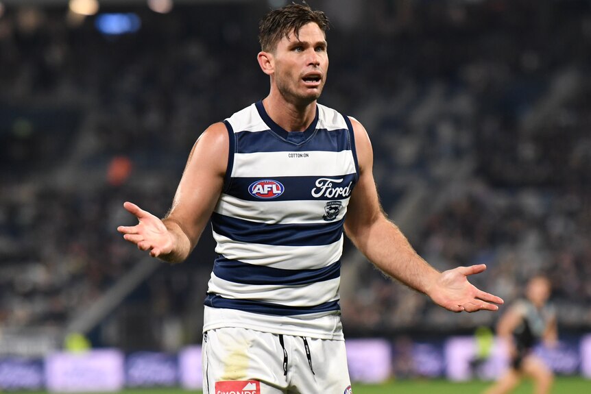 Tom Hawkins makes a gesture with his hands during Geelong's AFL loss to Port Adelaide.