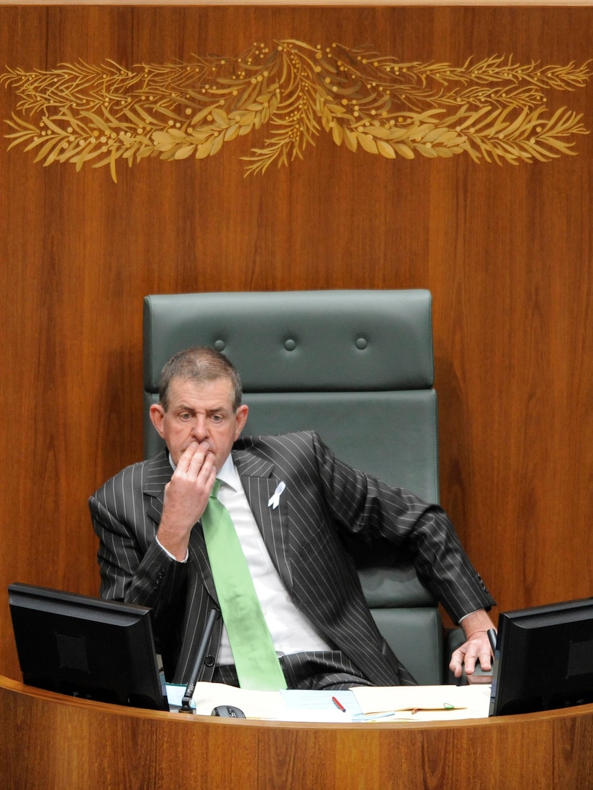 Peter Slipper sits in the Speaker's chair after his election as Speaker of the House.
