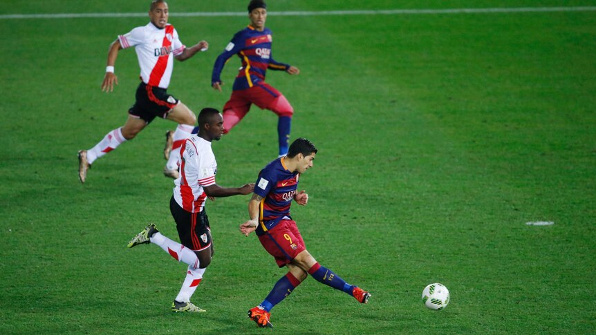 Luis Suarez scores his second goal against River Plate