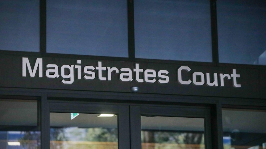 A close-up photo of a sign saying Magistrates Court.