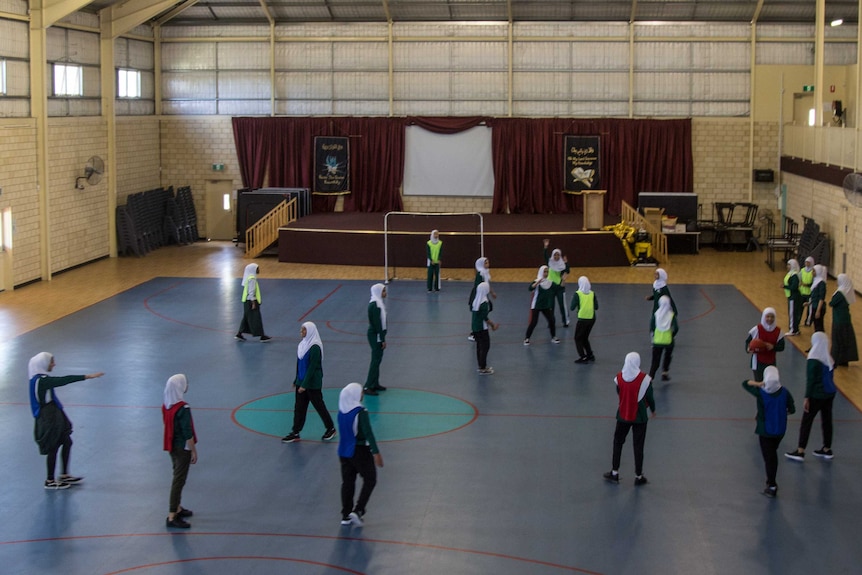 A sports lesson in the gym at Langford Islamic College.