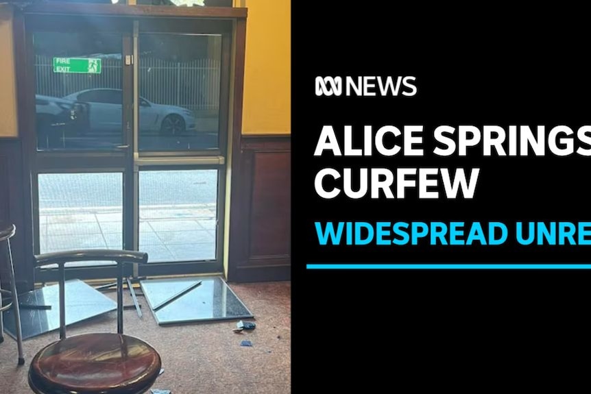 Alice Springs Curfew, Widespread Unrest: A damaged door viewed from the inside of an establishment.
