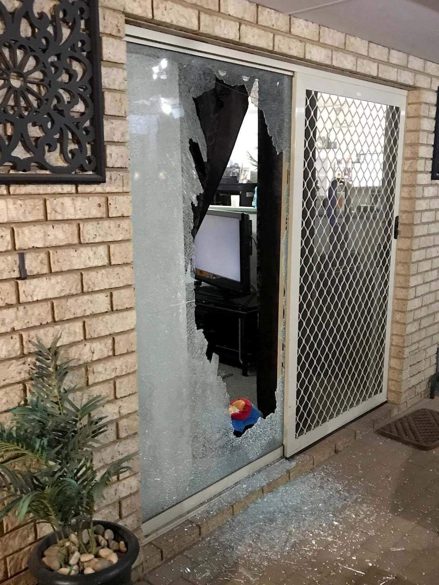 A smashed glass sliding door.