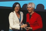 Premier Annastacia Palaszczuk handing Catherine McGregor her Queensland Australian of the year award