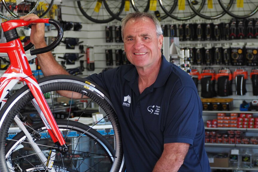 Tour Down Under race director Mike Turtur with a bike.