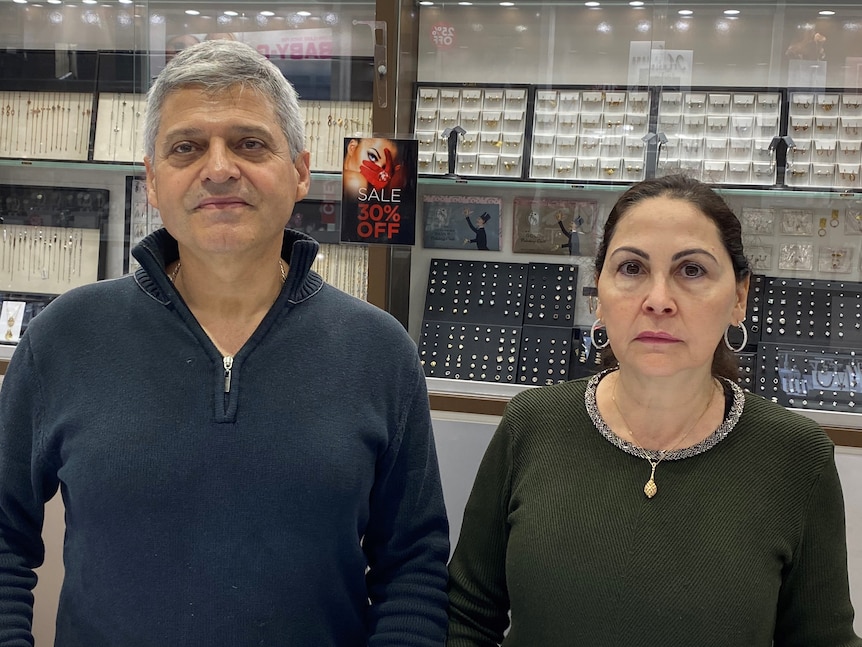 Charles and Fadia Nasr stand in the jewellery shop their own and operate.