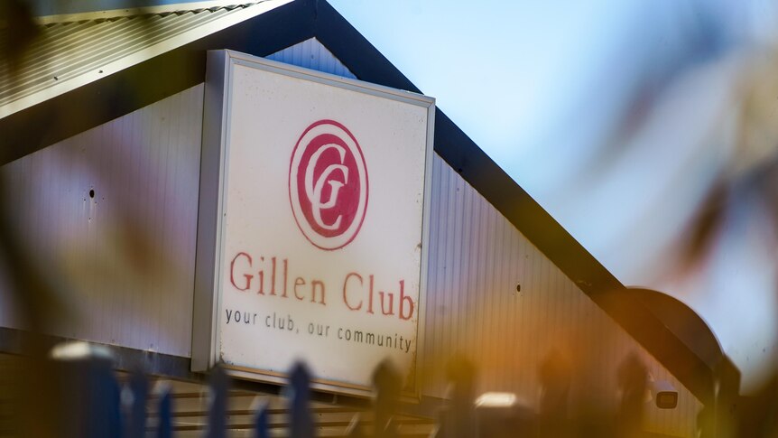 The exterior sign of the Gillen Club, with a slogan reading 'your club, your community'
