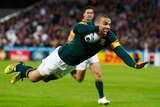 South Africa winger Bryan Habana scores against USA