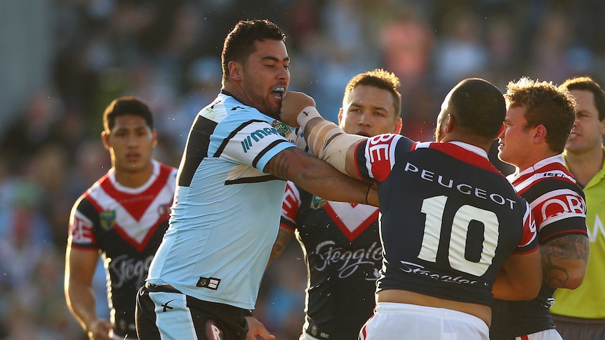 Cronulla's Andrew Fifita and the Sydney Roosters' Sam Moa exchange words at Shark Park in June 2015.