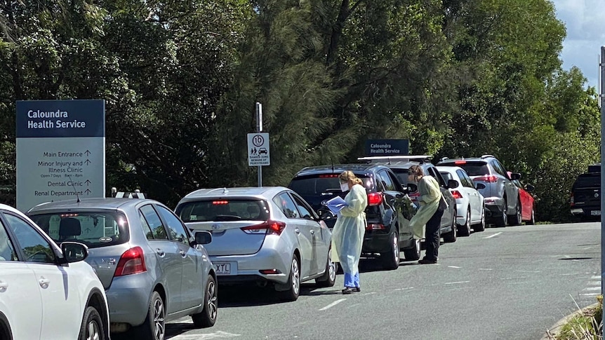 Cars line up outside the drive-through fever clinic at Caloundra.