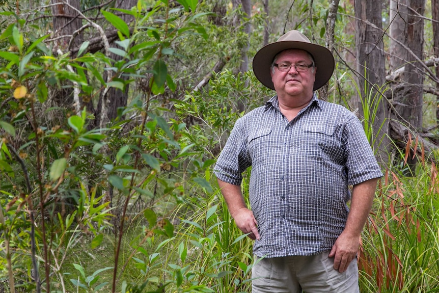 Ross Griffiths stands in the bush at Bundabah.