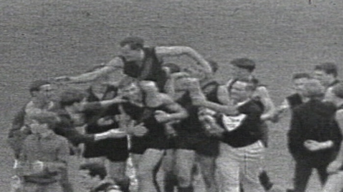 Ken Fraser is chaired off after the Bombers' 1965 premiership win.