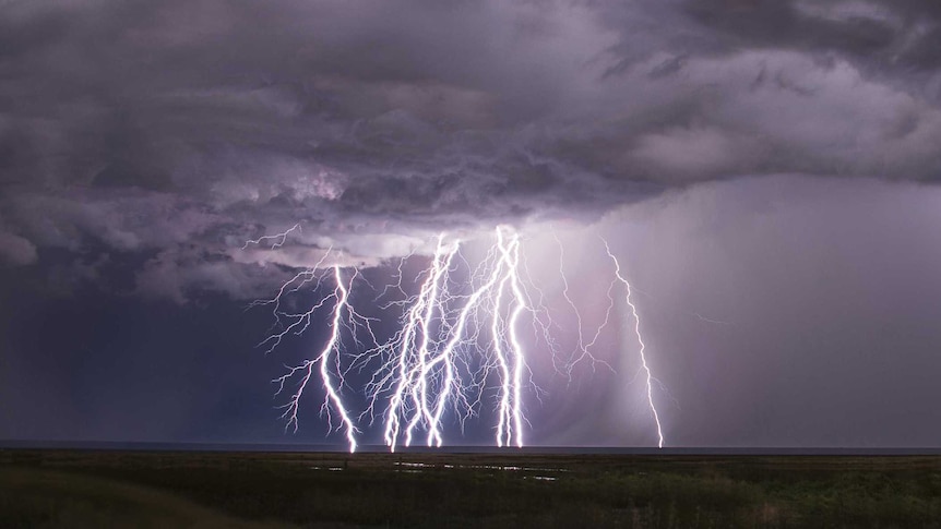 Gigantic bolts of lighting over the sea