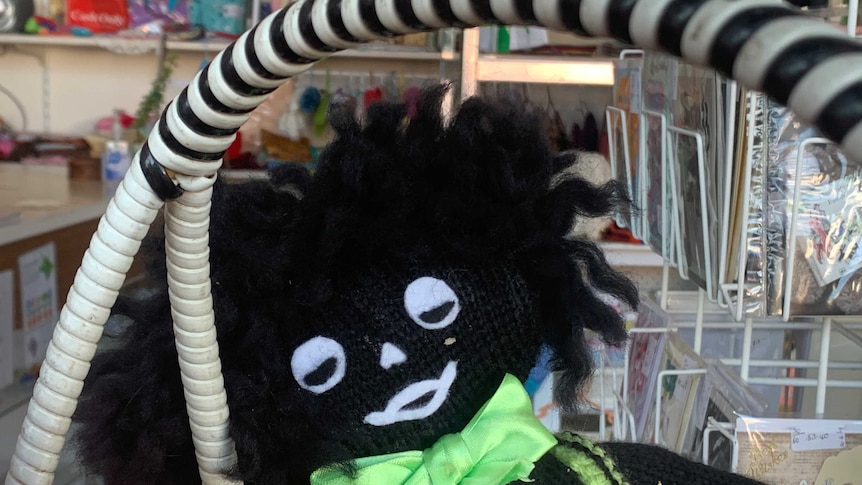 A golliwog displayed in a Horsham charity shop run by Uniting Church volunteers.