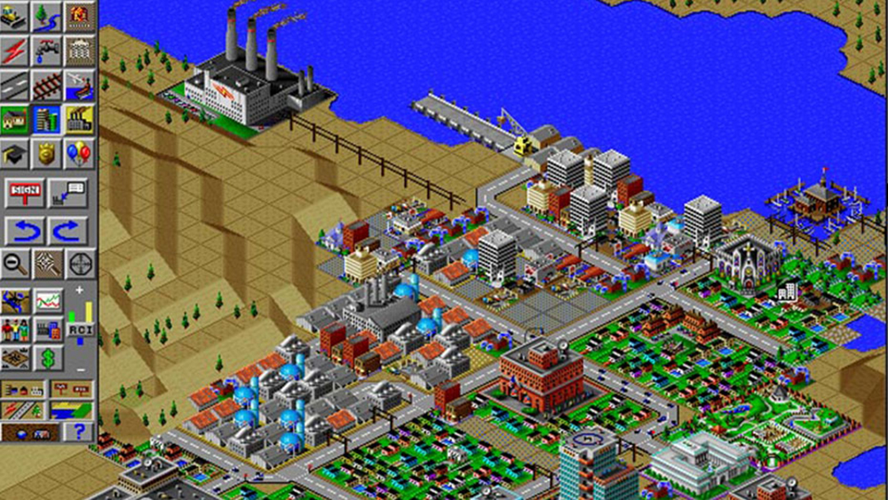 In a scene from a video game a city near water way is rendered on a grid in 1990s computer graphics from isometric perspective.