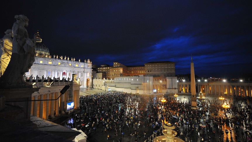 Catholics gather at St. Peter's Square as the papal conclave begins