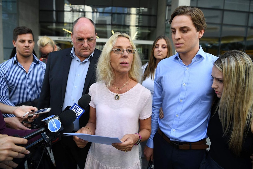 Anja Brack delivers a statement to the media after a man was found not guilty of murdering her son