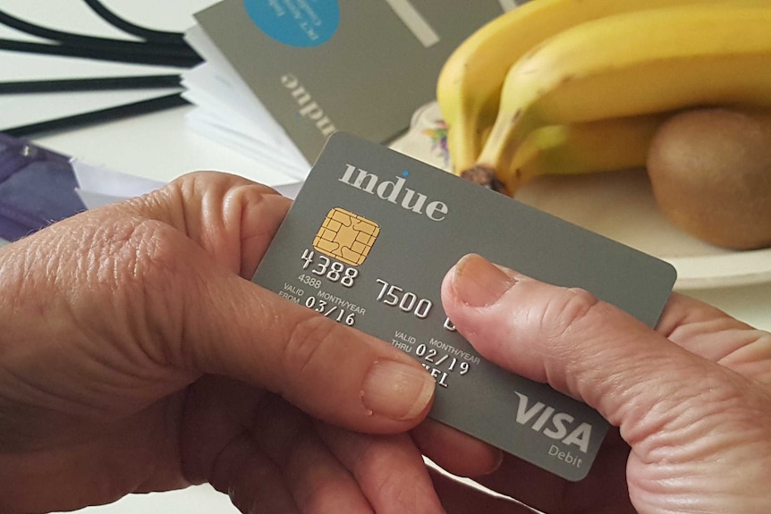 Ceduna local holding new cashless welfare card