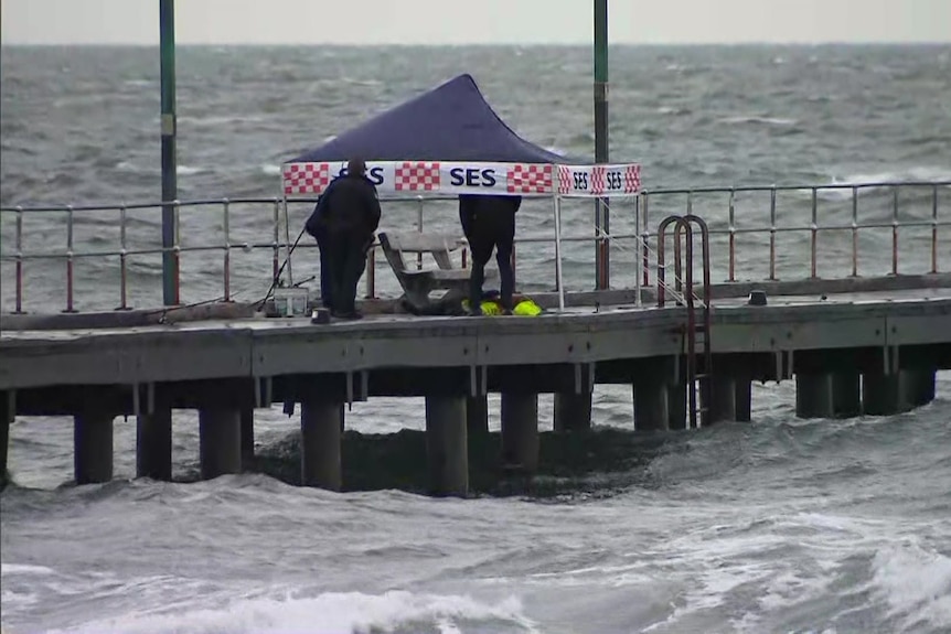 An emergency services tent on a pier