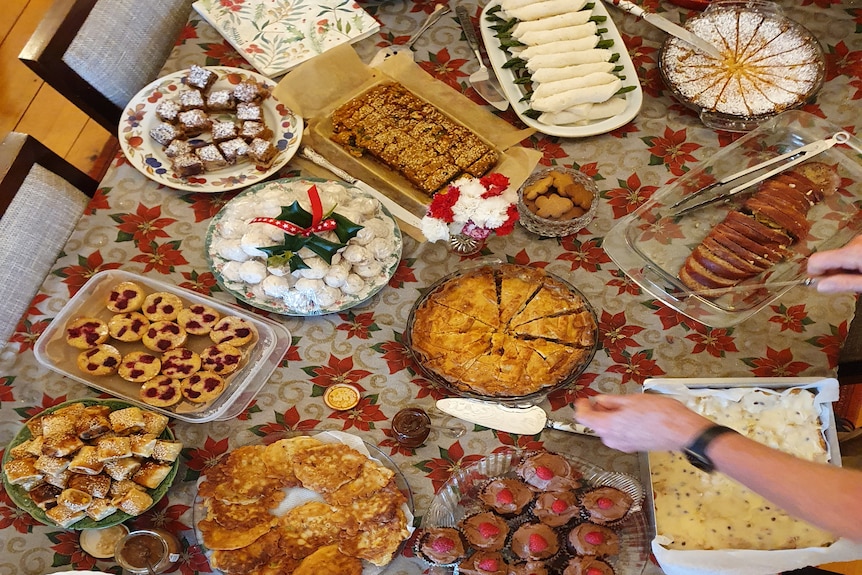 A table full of delicious baked food.