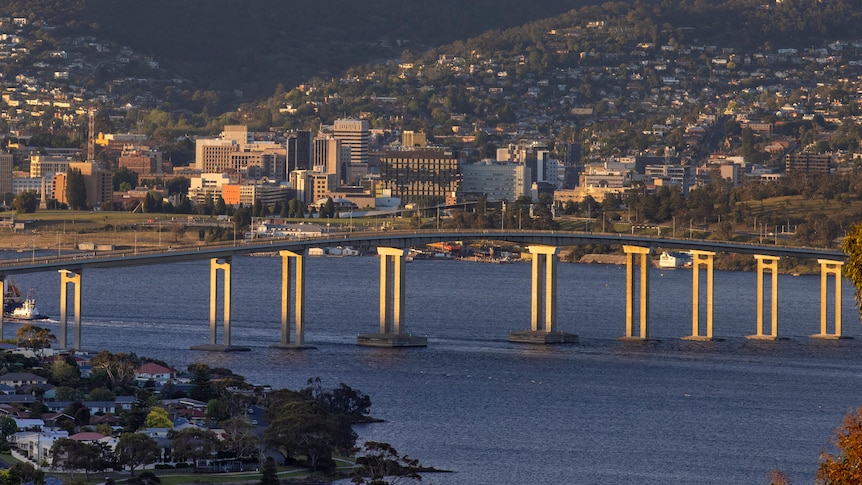 A large bridge spans the River Derwent.