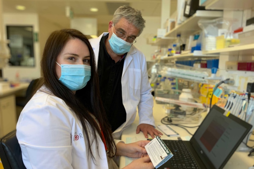 Two scientists in the Florey Institute laboratory.