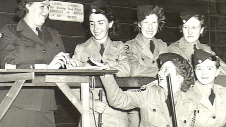 Black and white image of women in army uniforms in 1941