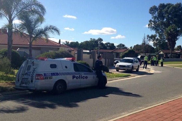 Police car and officers in Marangaroo, Perth, where young girl was hit by car