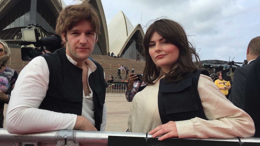 Two fans dressed as Hans Solo at a Star Wars fan event at the Sydney Opera House.