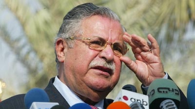 Iraqi President Jalal Talabani speaks to the media during a ceremony in Baghdad