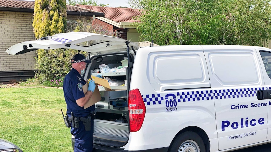 Police forensics van at the house at Marston Drive