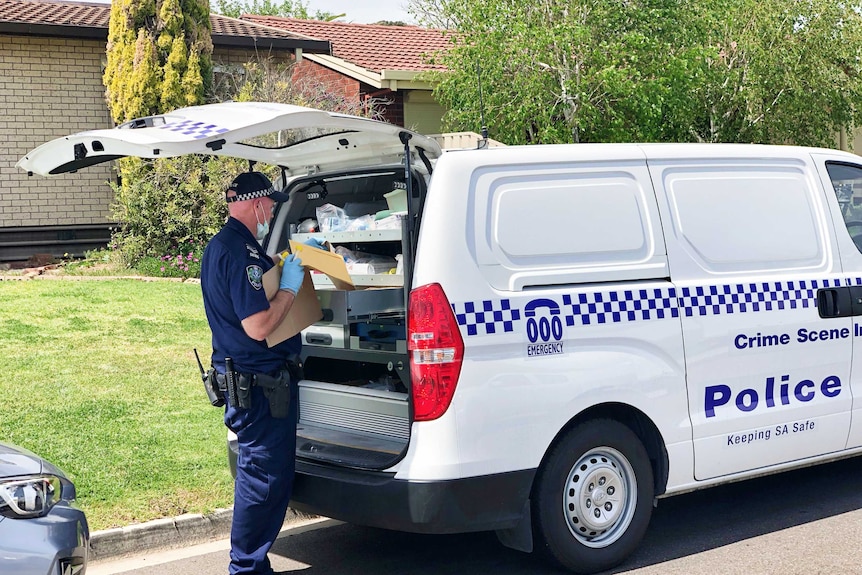 Police forensics van at the house at Marston Drive