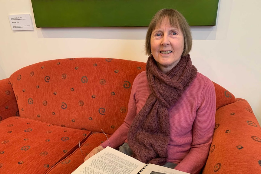 Jill Cassidy holding book.