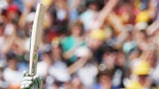 Ricky Ponting raises his bat after reaching his century in Boxing Day Test against South Africa