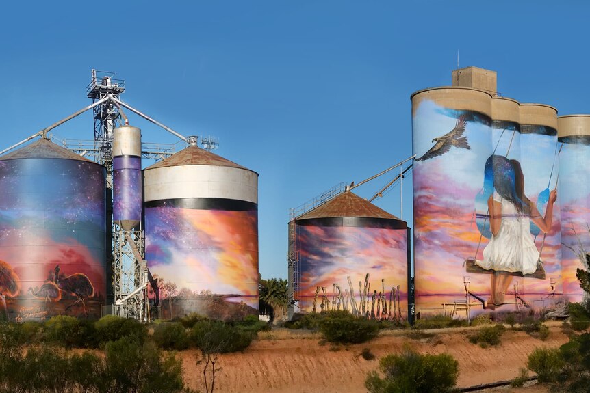 seven large painted silos