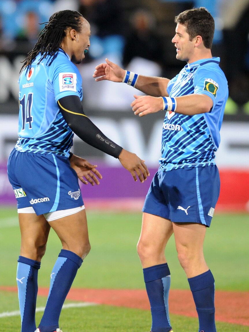 In the finals ... Akona Ndungane (L) celebrates with Morne Steyn after the Bulls' win