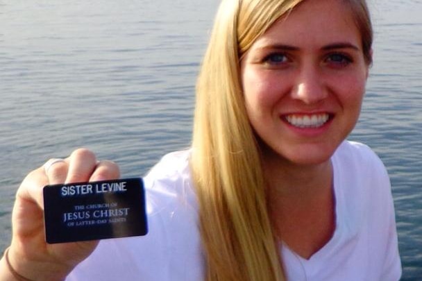 Kendal Levine holds her Mormon missionary badge.
