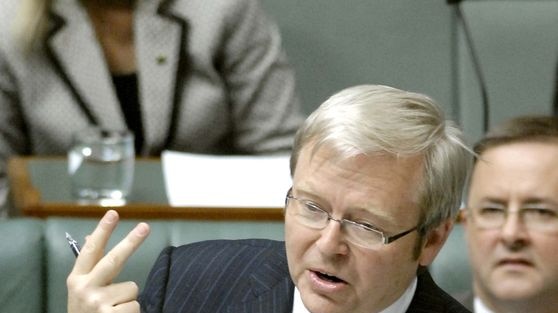 Prime Minister Kevin Rudd holds up two fingers during question time at Parliament House