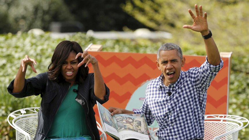 Former US first lady Michelle Obama and former president Barack Obama act out scenes from a children's book.