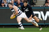Patrick Dangerfield playing against the Blues at the MCG.