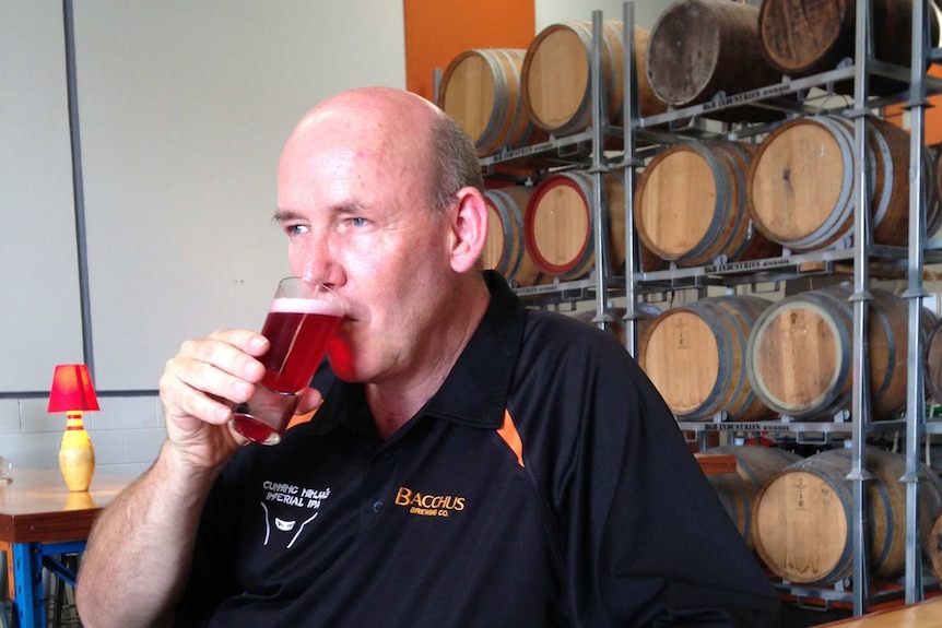 Bacchus Brewery owner Ross Kenrick drinking the Abbott's Budget Smugglers Redneck Ale.