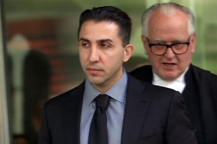 Rocco Arico leaves court during trial