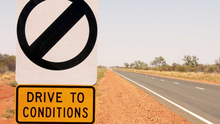 An image of an open speed limit sign on the Stuart Highway, north of Alice Springs