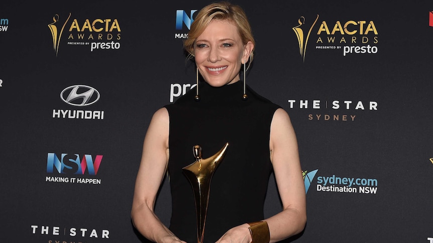 Australian actor Cate Blanchett poses for a photograph after winning the Longford Lyell Award