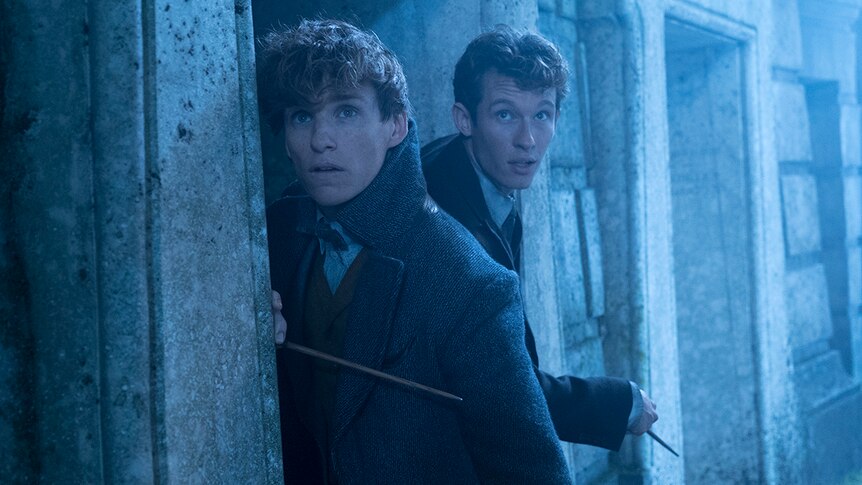 Colour still of Eddie Redmayne and Callum Turner in 2018 film Fantastic Beasts: The Crimes of Grindelwald.