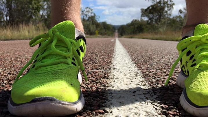 Running shoes on an outback Australian road.