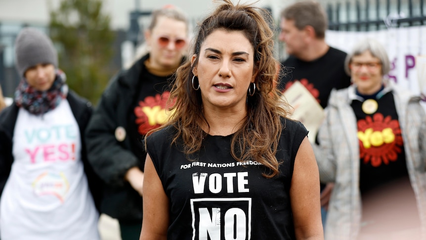 Senator Lidia Thrope wearing a black top that says Vote No